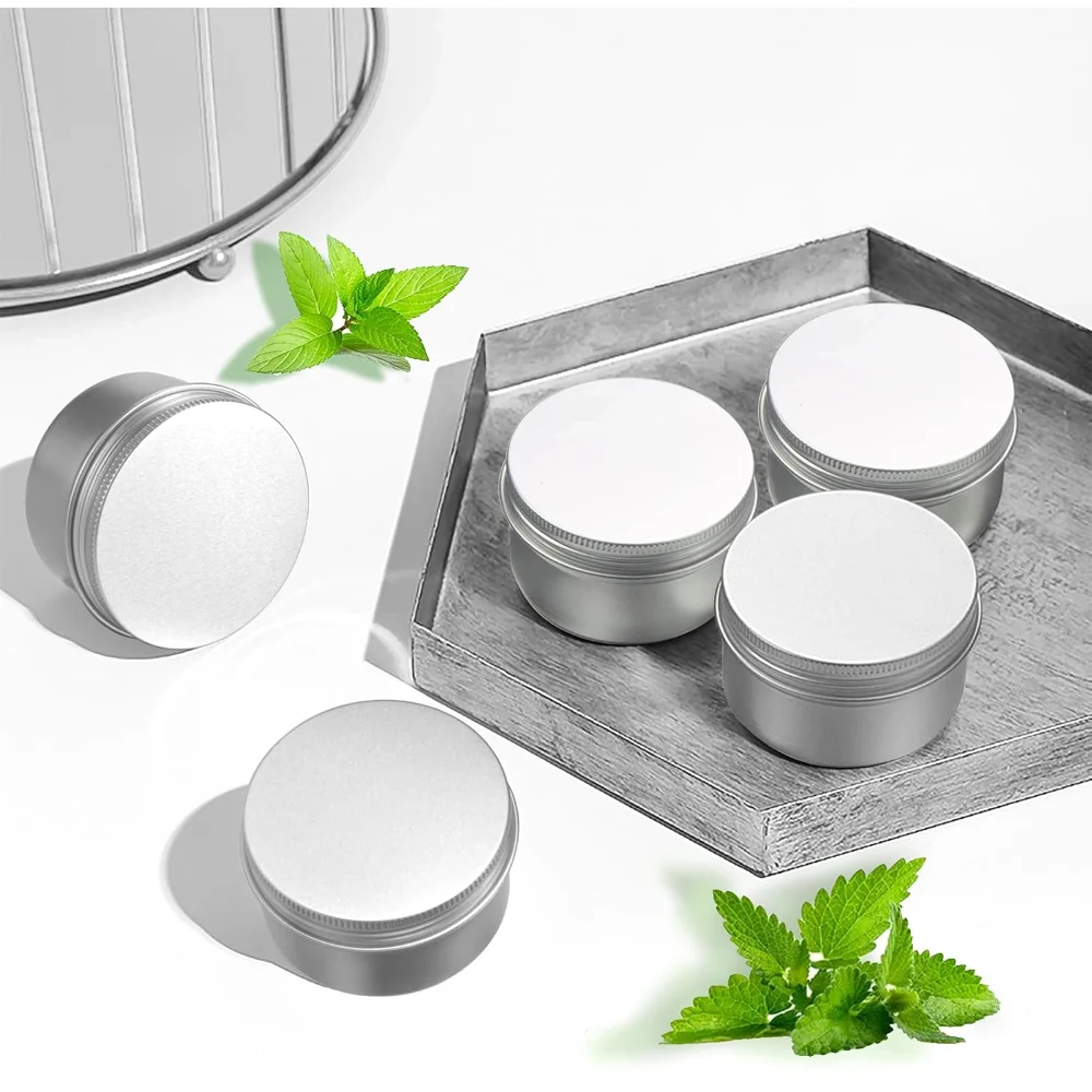 Four-ounce tins, lids off